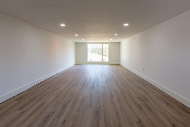 spare room featuring dark hardwood / wood-style flooring