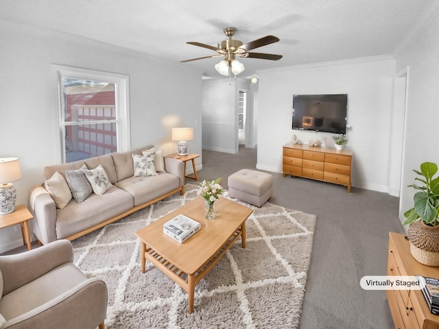 living room with ceiling fan, carpet, ornamental molding, and a textured ceiling