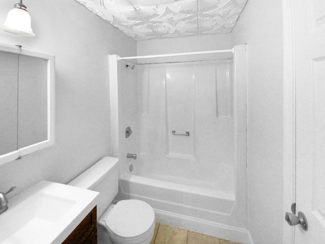 full bathroom featuring vanity, toilet, tile patterned floors, and shower / washtub combination