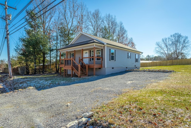 view of front of property featuring covered porch