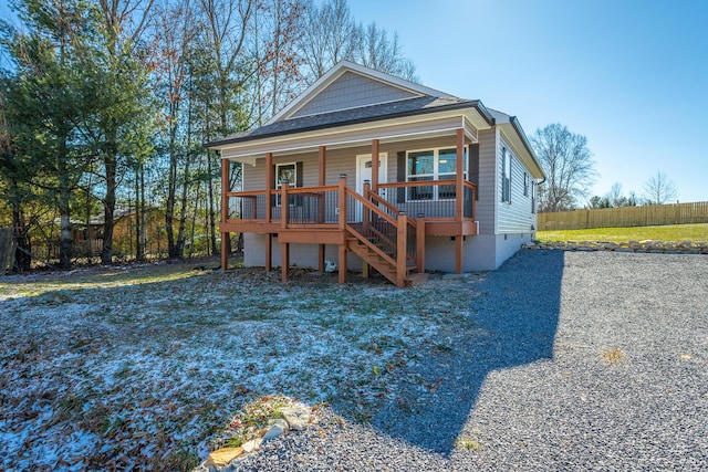 view of front of home featuring covered porch