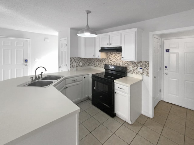 kitchen featuring pendant lighting, white cabinetry, and black / electric stove