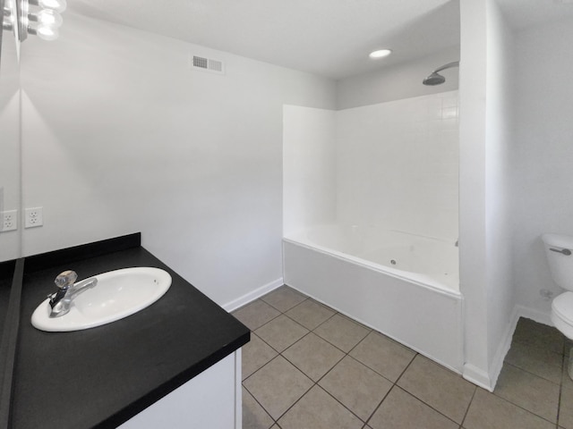 full bathroom with vanity, toilet, tile patterned floors, and shower / washtub combination