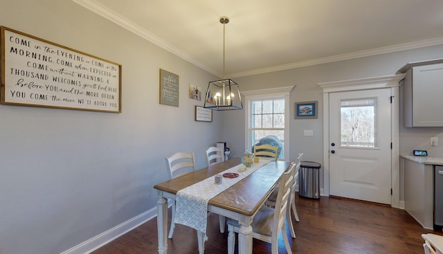 dining room with crown molding, a chandelier, and dark hardwood / wood-style floors