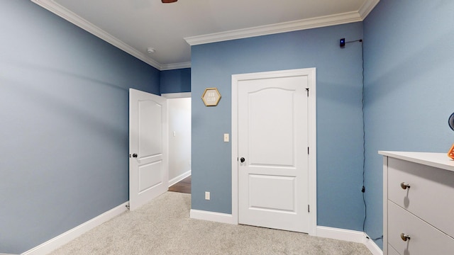 unfurnished bedroom with ceiling fan, light carpet, and ornamental molding