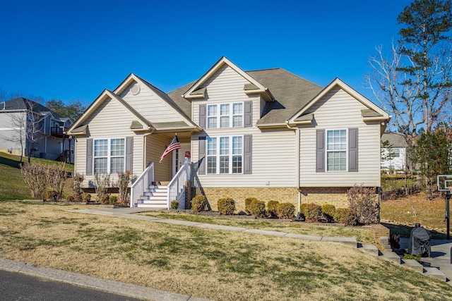 view of front of property with a front lawn