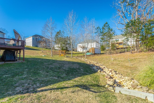 view of yard with a wooden deck