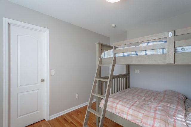 bedroom featuring wood-type flooring