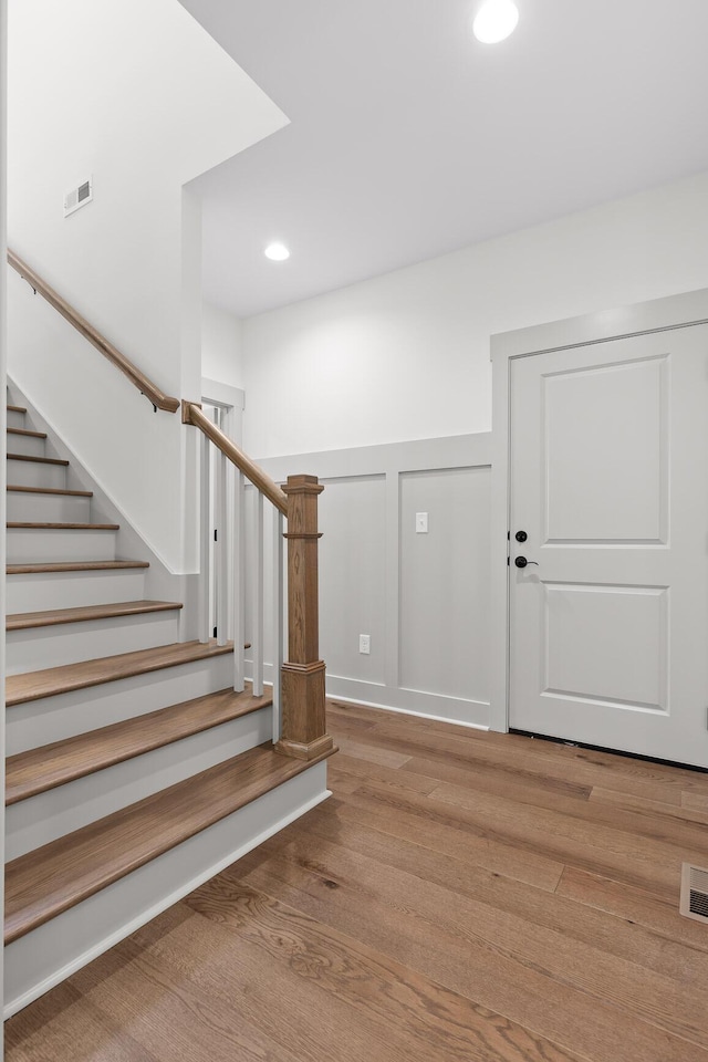 foyer entrance featuring wood-type flooring