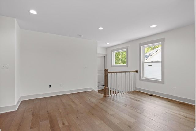 empty room with light wood-type flooring