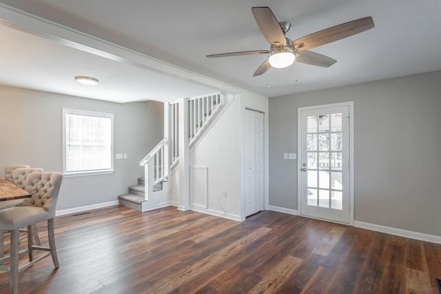 interior space featuring dark hardwood / wood-style floors and ceiling fan