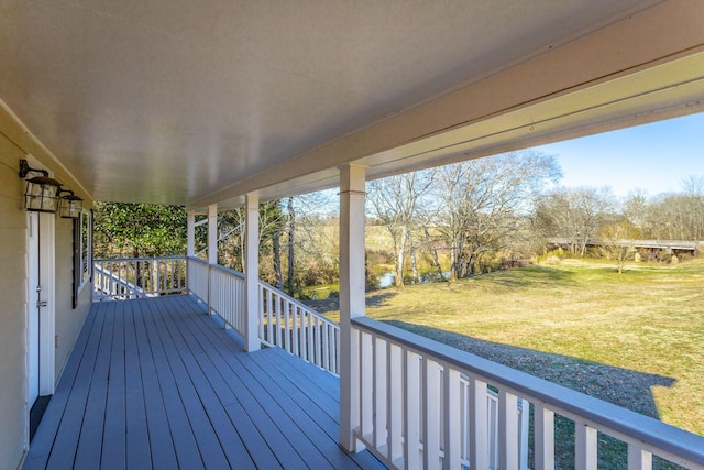 deck featuring a yard