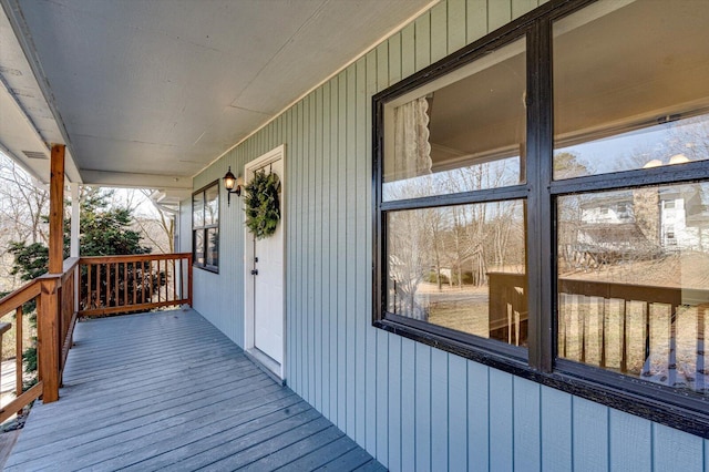 wooden deck featuring covered porch