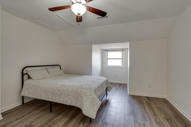 bedroom featuring hardwood / wood-style flooring, vaulted ceiling, and ceiling fan