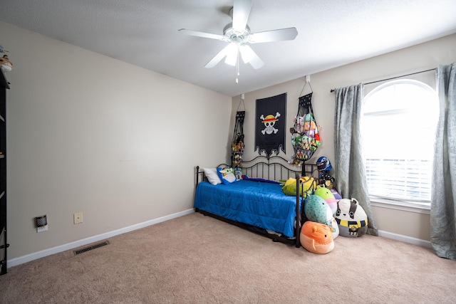 bedroom with carpet flooring and ceiling fan