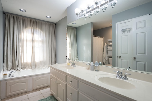 bathroom featuring vanity, toilet, and tile patterned flooring