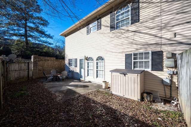 back of property featuring a patio