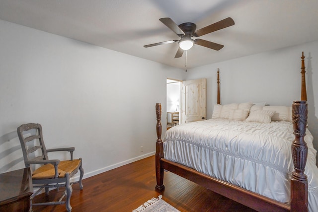 bedroom with dark wood-type flooring and ceiling fan