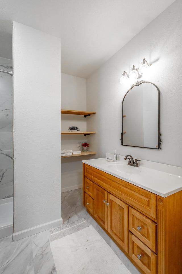 bathroom featuring vanity and walk in shower