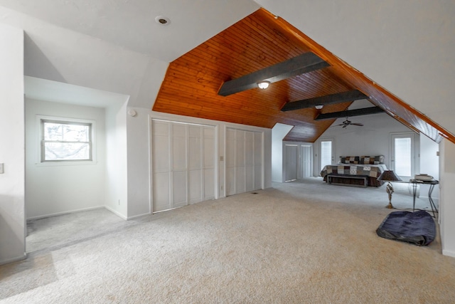 bonus room with beamed ceiling, light carpet, wooden ceiling, and high vaulted ceiling