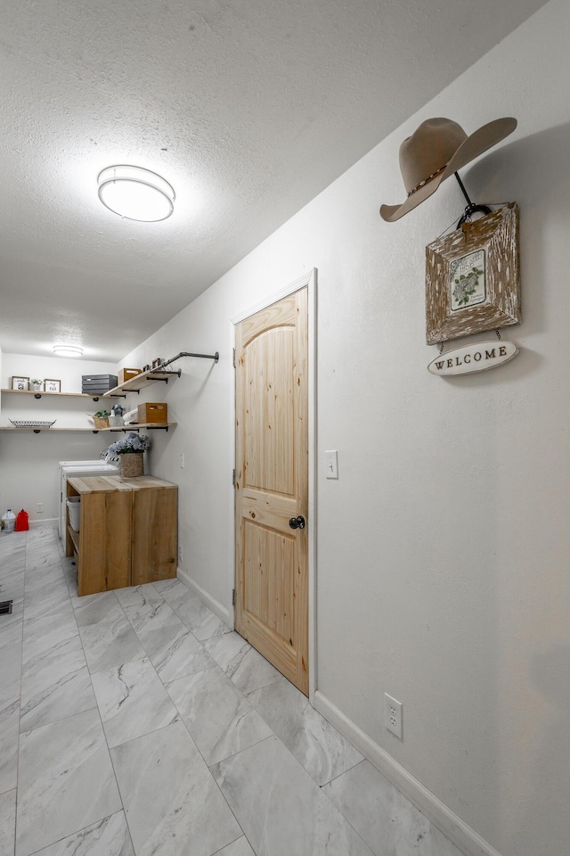 bathroom with a textured ceiling