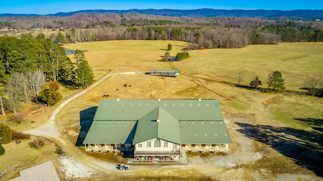 bird's eye view featuring a rural view and a mountain view