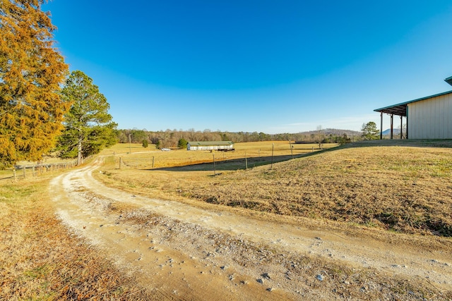 view of street featuring a rural view