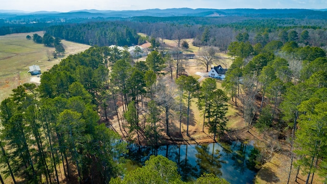 aerial view featuring a water and mountain view