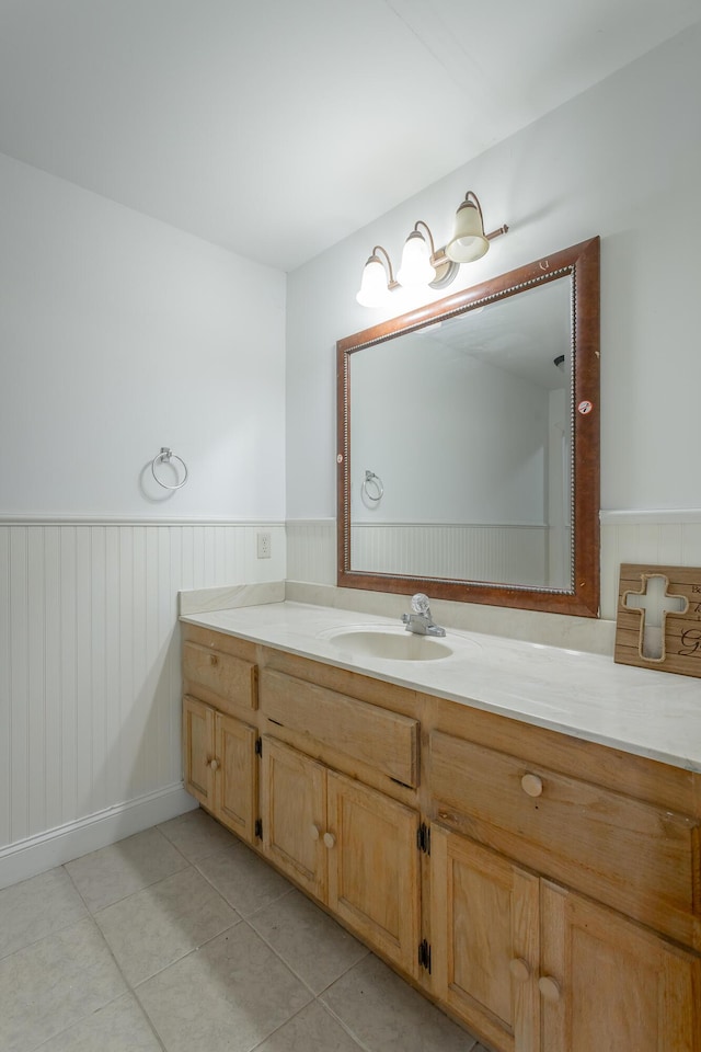 bathroom with vanity and tile patterned flooring