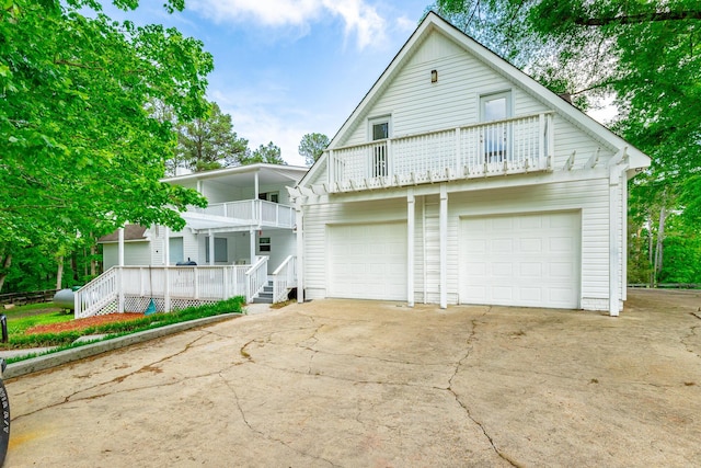 721 Gowan Rd, Lafayette, GA 30728 - view of front of property featuring a balcony, a garage, and driveway