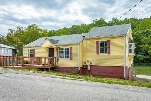 view of front of home with a deck