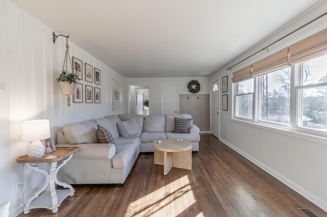 living room with dark wood-type flooring