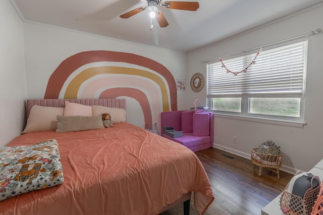 bedroom featuring ceiling fan, dark hardwood / wood-style flooring, and ornamental molding