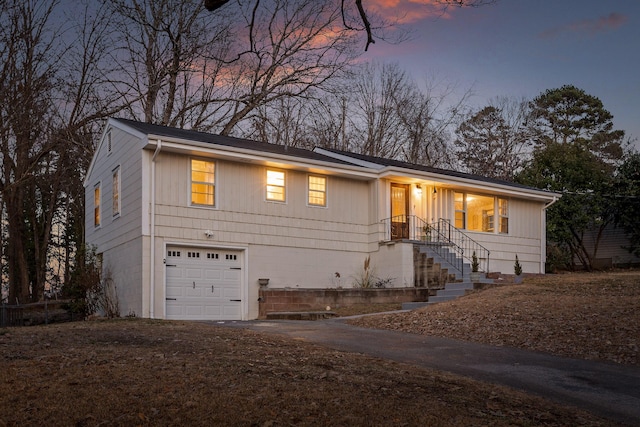 view of front of property with a garage