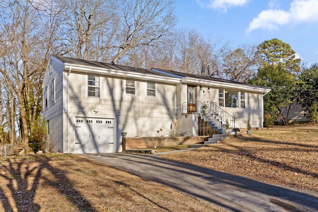 view of front of property with a garage