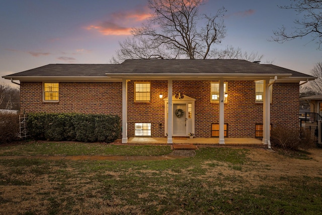 view of front of home featuring a yard