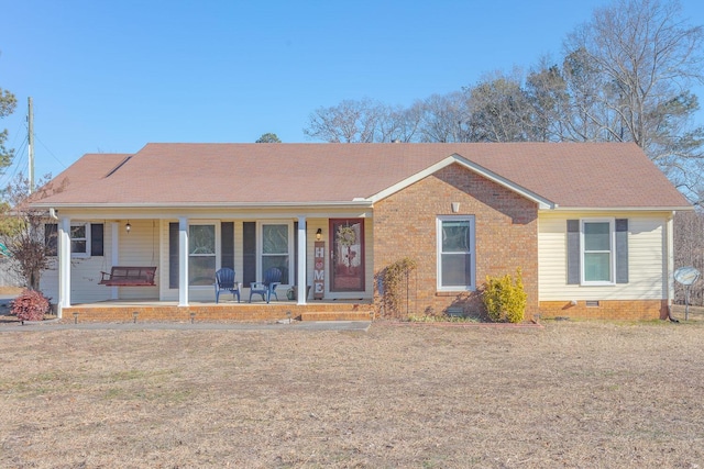 view of front of home with a porch and a front lawn