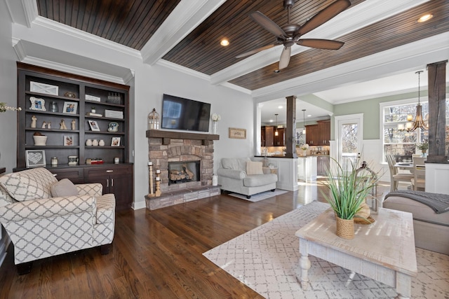 living room with beam ceiling, wooden ceiling, ornamental molding, dark hardwood / wood-style flooring, and a fireplace