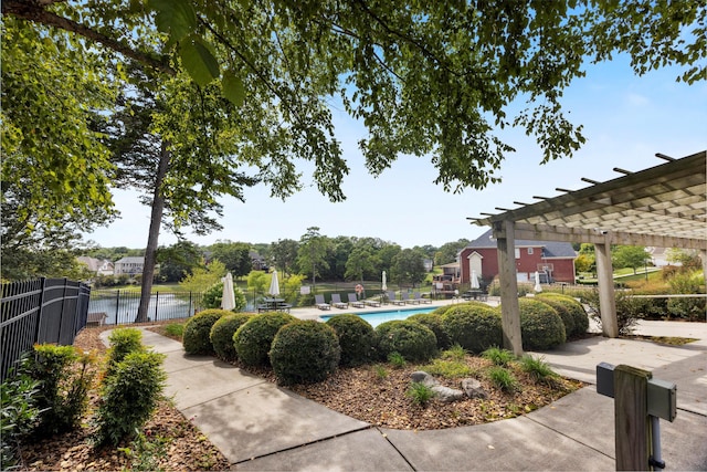 surrounding community featuring a water view, a swimming pool, and a pergola