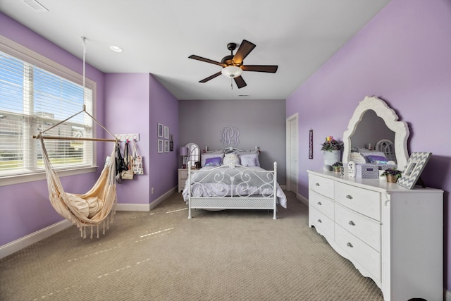 bedroom featuring ceiling fan and light colored carpet