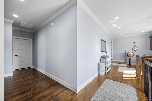 corridor with dark hardwood / wood-style flooring and crown molding