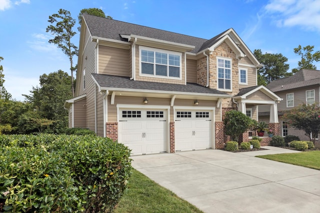 craftsman-style house with a garage