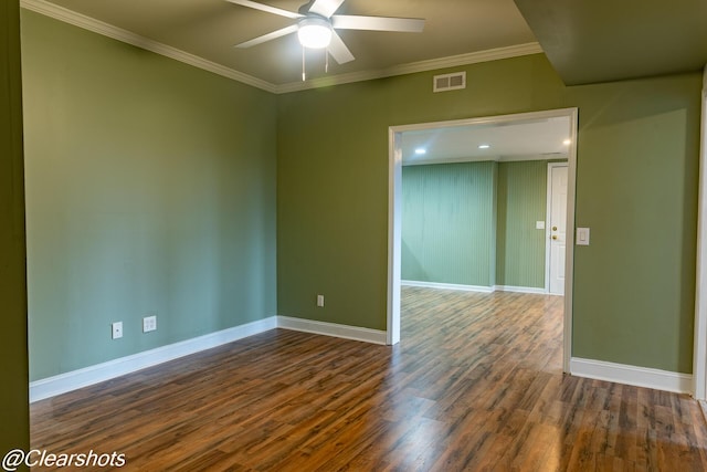 unfurnished room with crown molding, ceiling fan, and dark hardwood / wood-style flooring