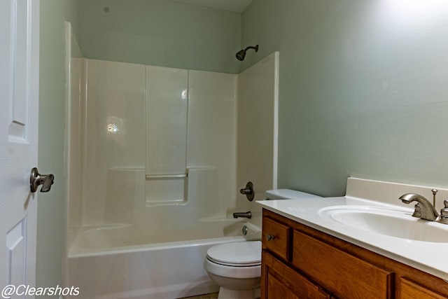 full bathroom featuring  shower combination, toilet, and vanity