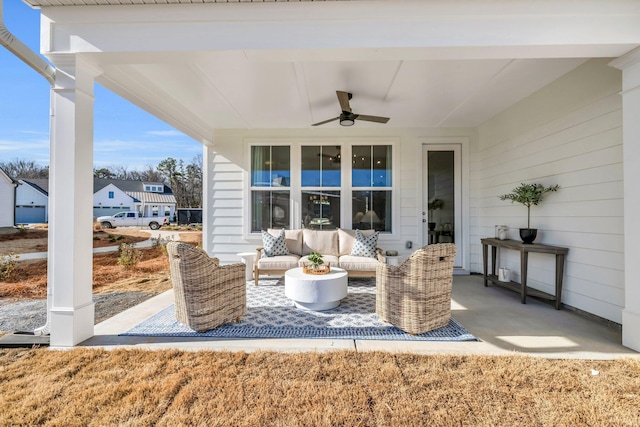 view of patio with outdoor lounge area and ceiling fan