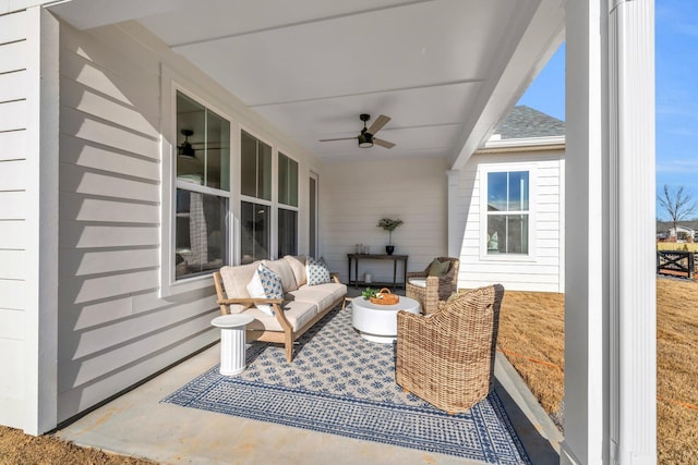 view of patio featuring ceiling fan and an outdoor living space