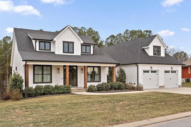 modern farmhouse featuring a front yard, central AC, a porch, and a garage