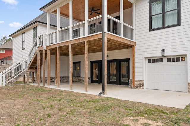 back of property featuring ceiling fan, a patio, and a yard