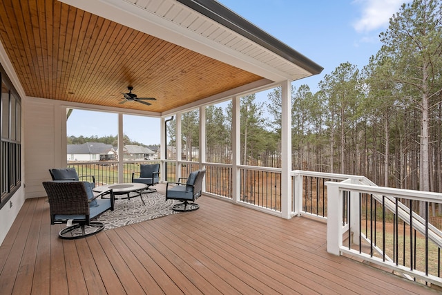 wooden terrace with ceiling fan