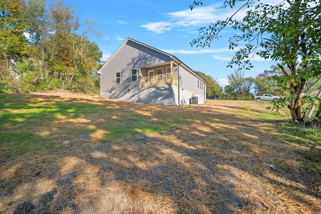 view of property exterior featuring a lawn